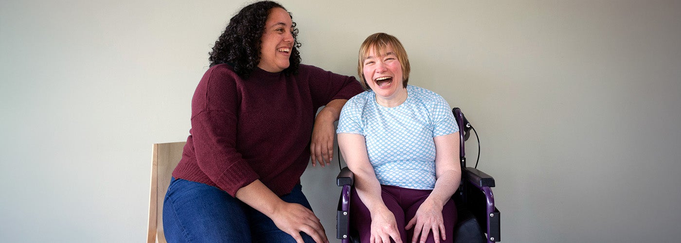Carer laughing with client