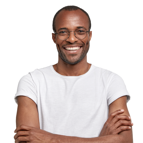 Young adult man smilling with his arms crossed and wearing glasses