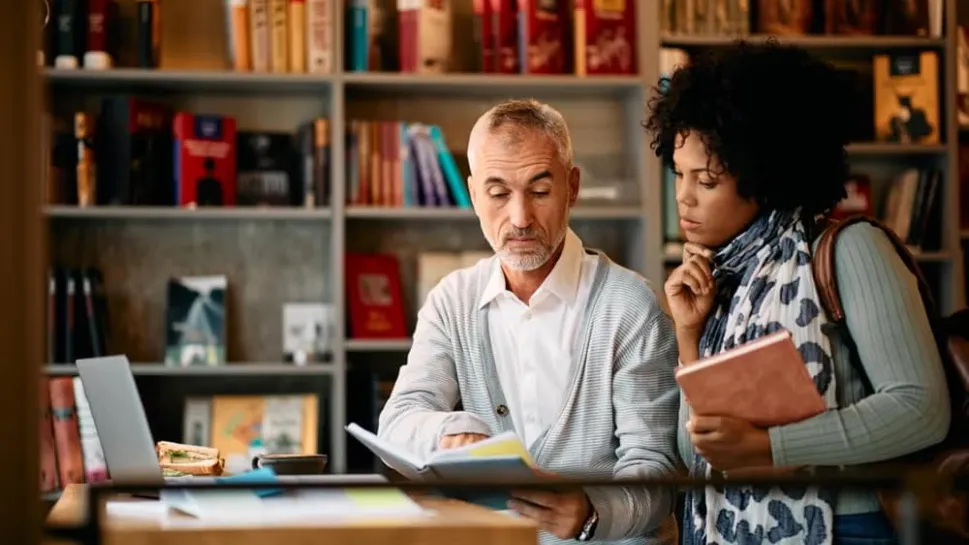 Two professionals engage in active learning strategies for career and professional development