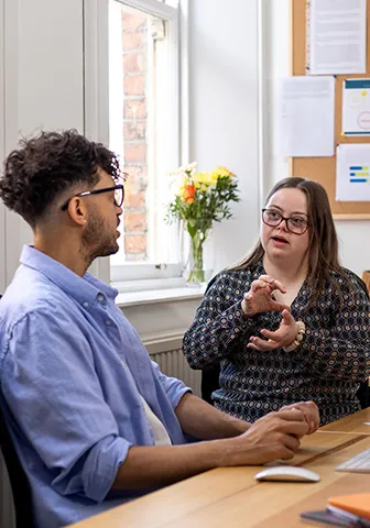 Colleagues discussing post graduate studies
