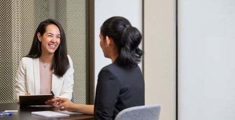 Two ladies in conversation discussing how to become a counsellor in Australia.